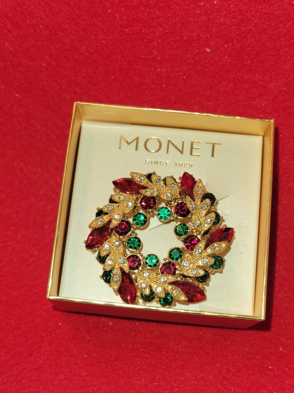 Monet Gold-Tone Brooch with Red and Green Crystals